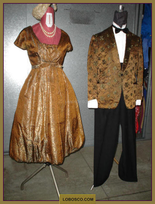 lobosco.com_00003067_abiti_uomo_donna_1920_woman_man_dress_gangster_bronzeo_bronz_costumi_abiti_teatrali_storici_carnevale_spettacolo_costumes_clothing_theatrical_historical_carnival_performance_anni_50_coppia.jpg
